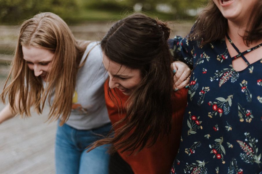 friends laughing, outgoing introvert