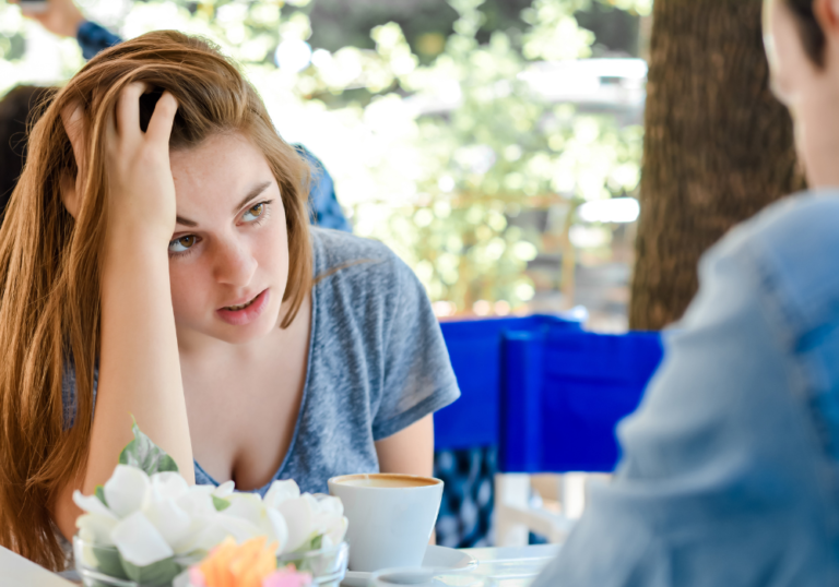 woman frustrated at guy in a date signs he's not into you