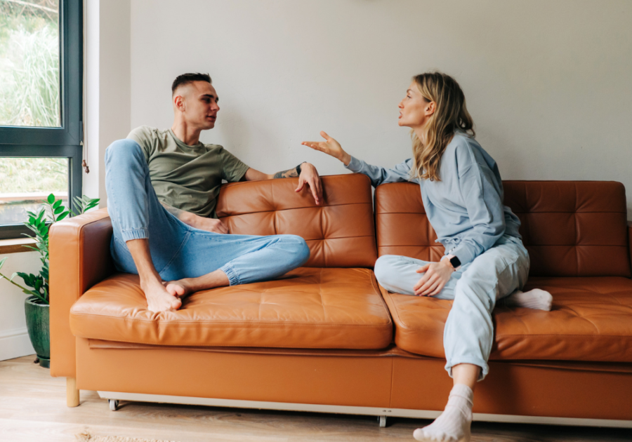 couple arguing on sofa Why Am I So Mean To My Boyfriend