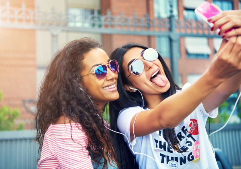 woman posing for selfie Types of Friendships