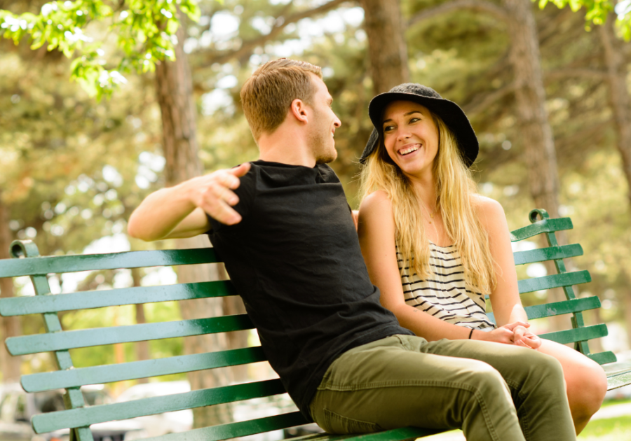 couple sitting on bench Couple Questions Game