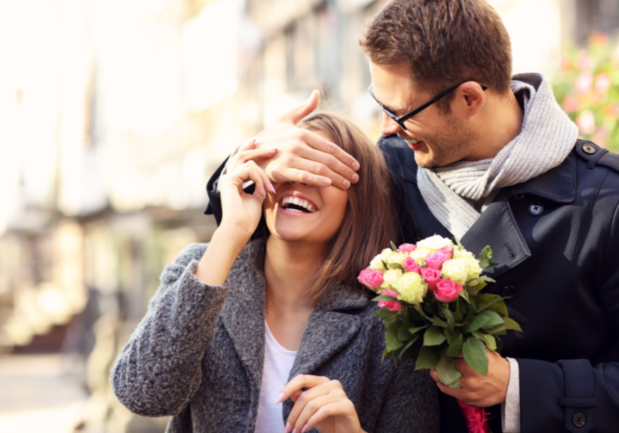 man cover her eyes smiling How to Be a Good Boyfriend