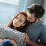 man consoling woman with hug Losing Feelings