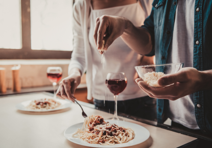 couple making dinner together what to do on a Saturday night