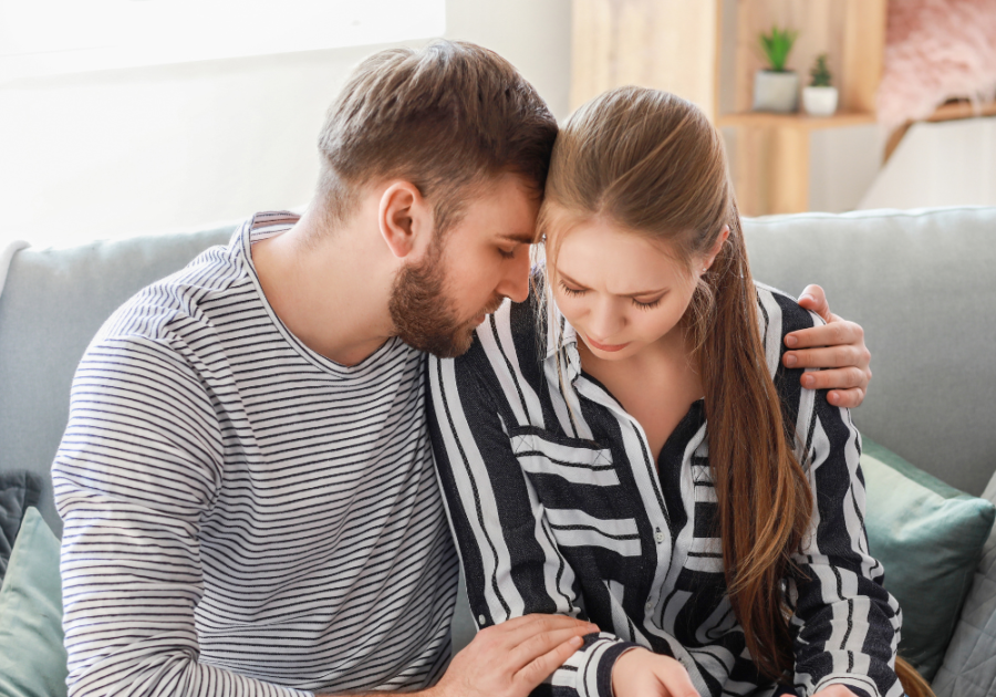 emotional couple hugging on sofa Daddy Issues in Women