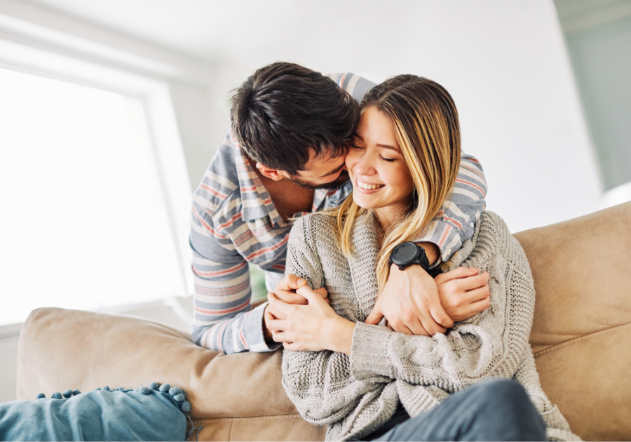 Man hugging woman from behind Respect Your Wife's Feelings