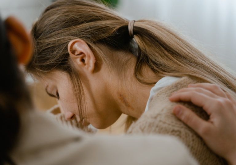 woman sad being consoled Disappointed When Someone You Love Hurts You