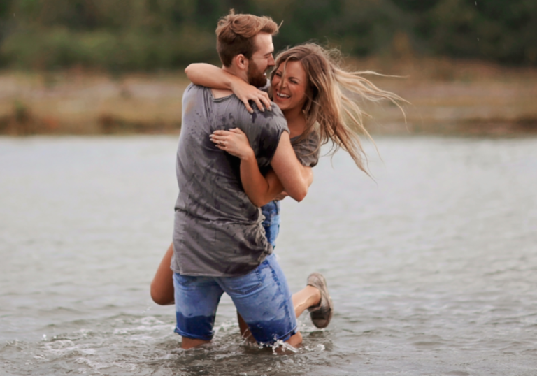 couple hugging in river What an Aquarius Man Needs in a Woman