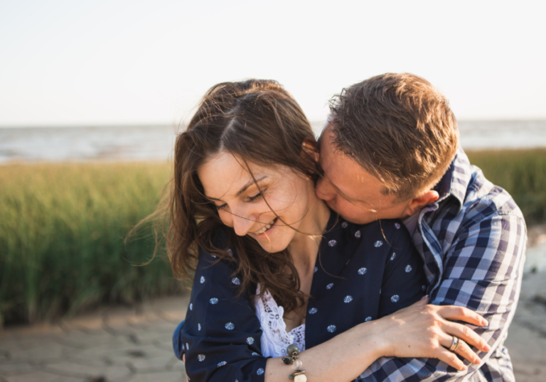 woman hugging woman and kissing her neck Aquarius and Virgo Compatibility