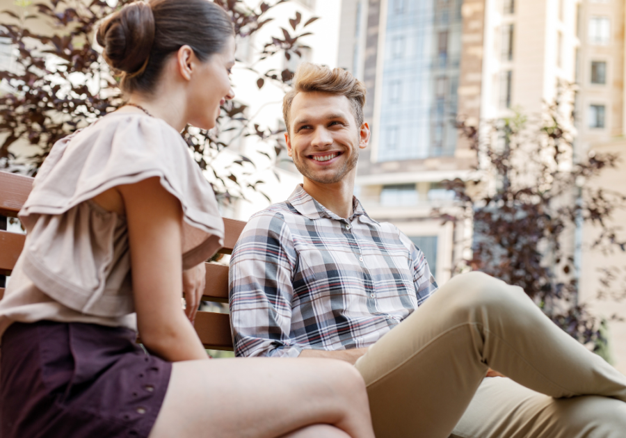 couple sitting outside talking things to talk about with your crush