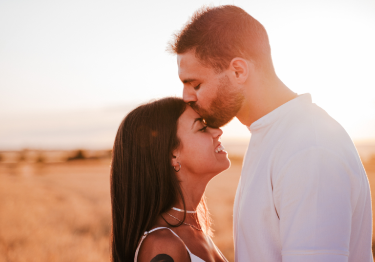 man kissing woman on forehead When a Taurus Man Thinks You're the One