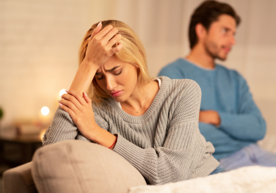 woman sitting beside man on sofa sad Daddy Issues Quiz