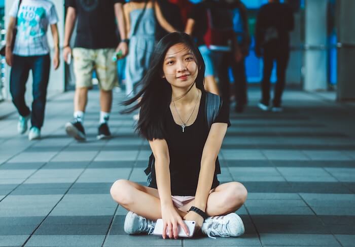 woman sitting in crowd list of core values