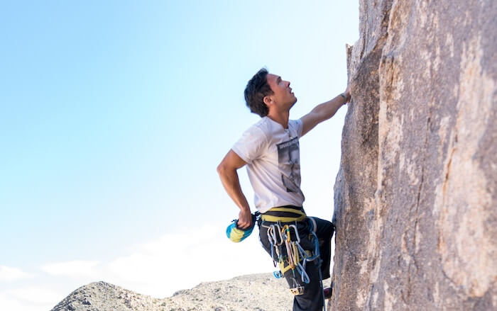 man climbing rock how to find yourself