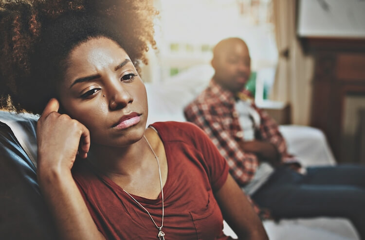 woman sitting on sofa emotional detachment