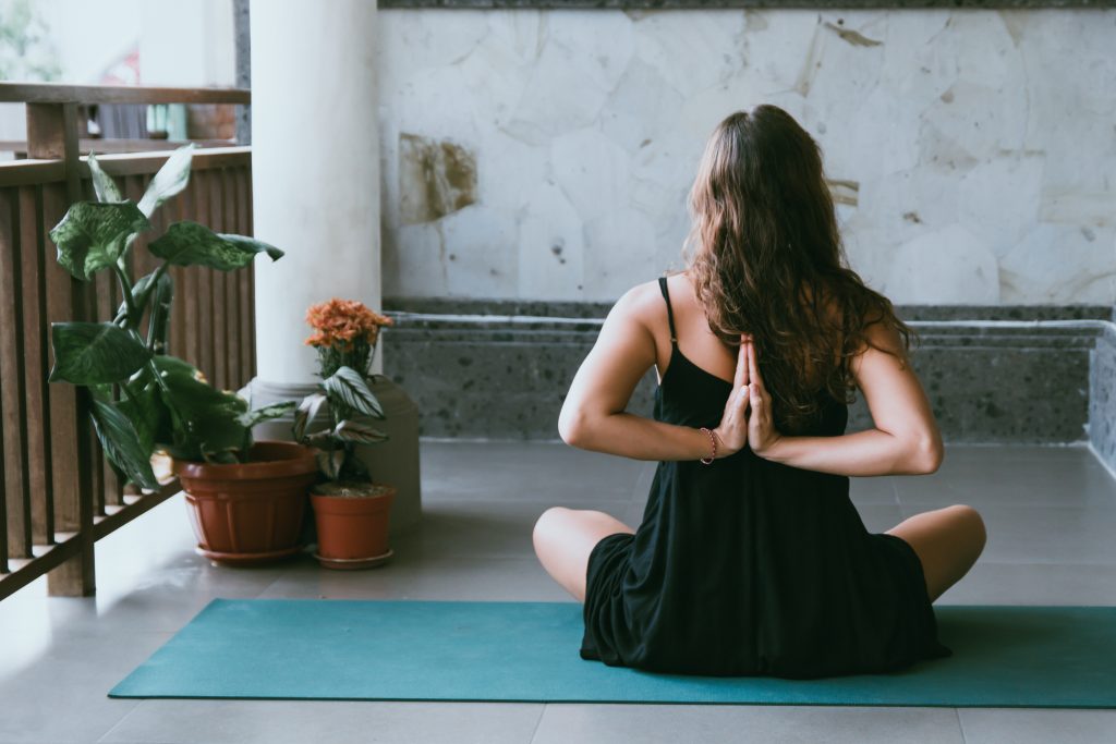 woman doing yoga, things to do when bored