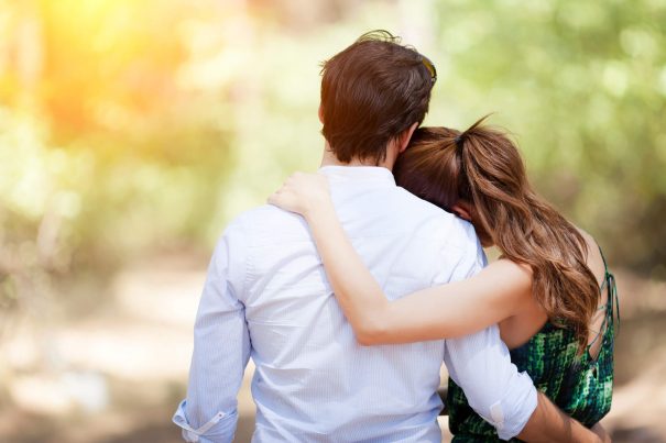 couple embracing outdoors reserved personality