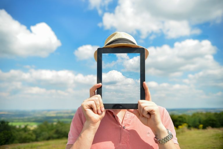 Man holding mirror, Sensing Vs. Intuition