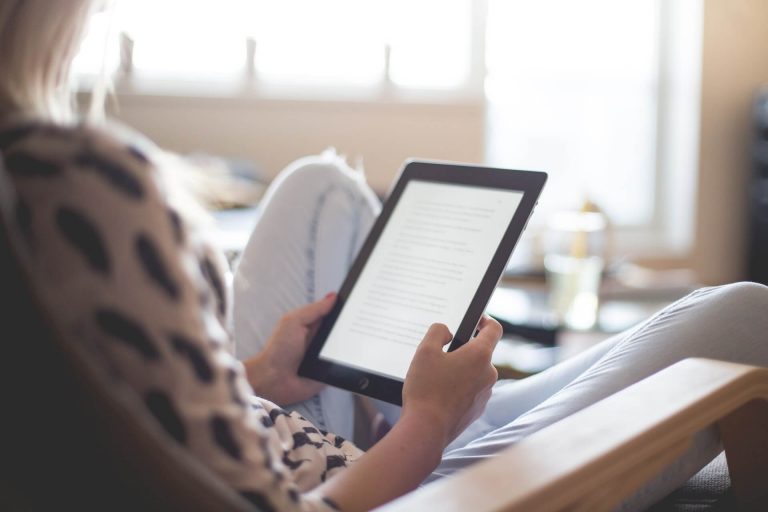 woman reading, books on happiness