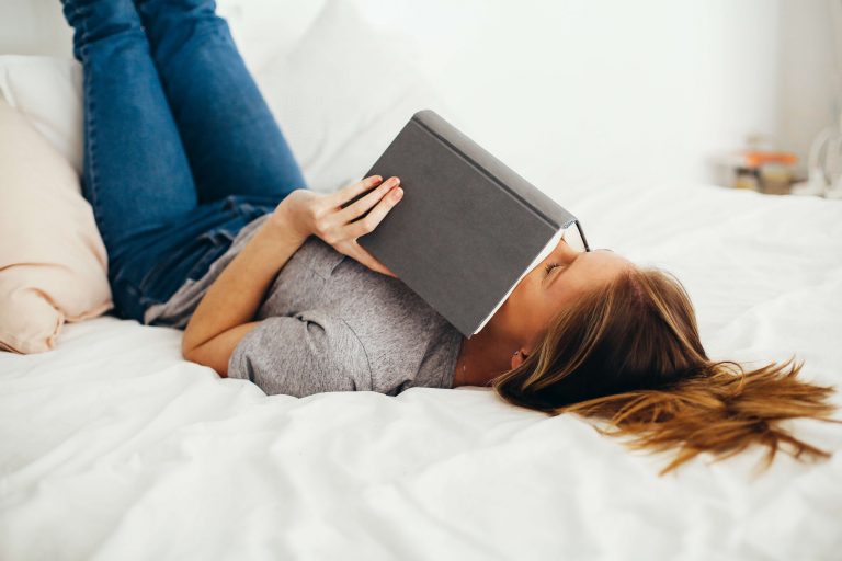 woman reading, self-confidence books