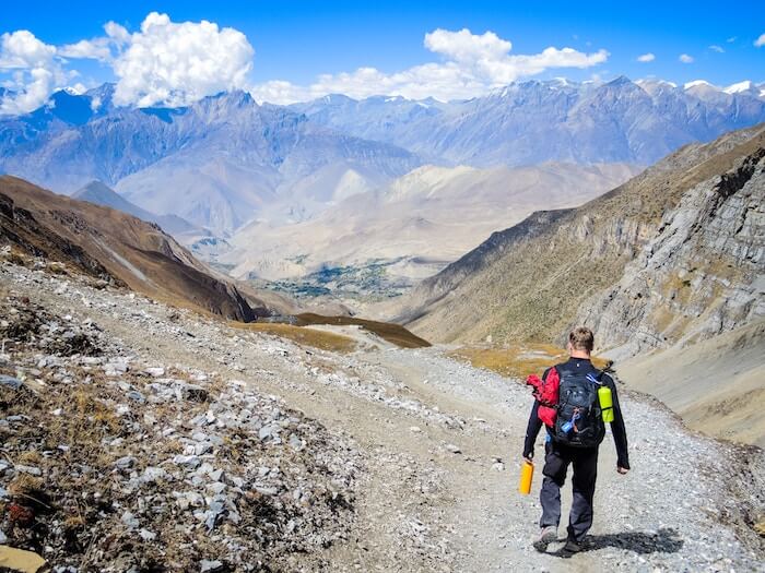 hiking in mountains overcoming obstacles