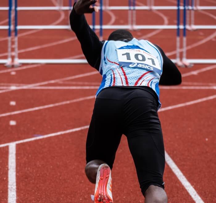 runner hurdles overcoming obstacles