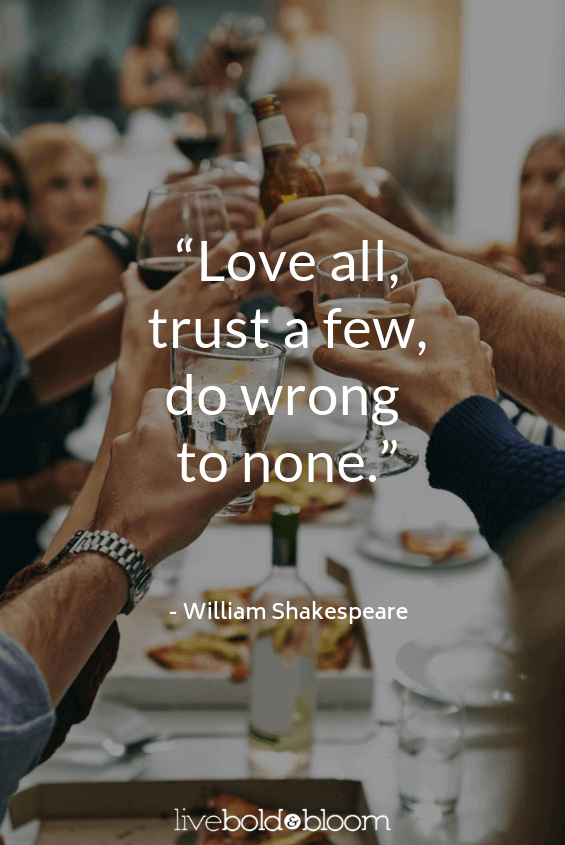 group at dinner toasting short positive quotes