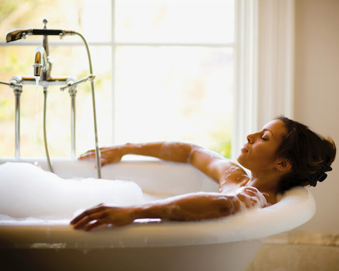 woman in bubble bath how to let go of anger