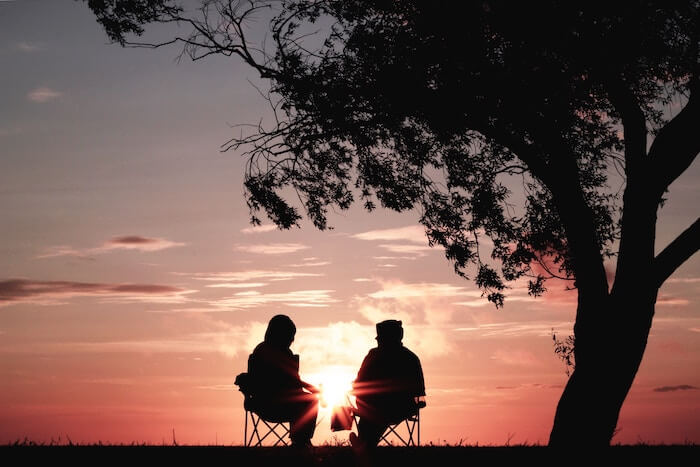 couple talking at sunrise Relationship Quizzes