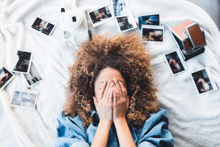 woman with photos, how to stop obsessing over someone