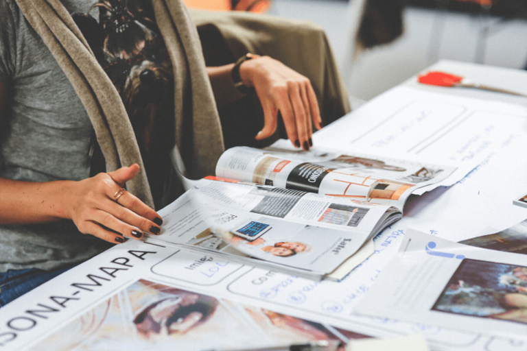 woman with magazine, vision board ideas