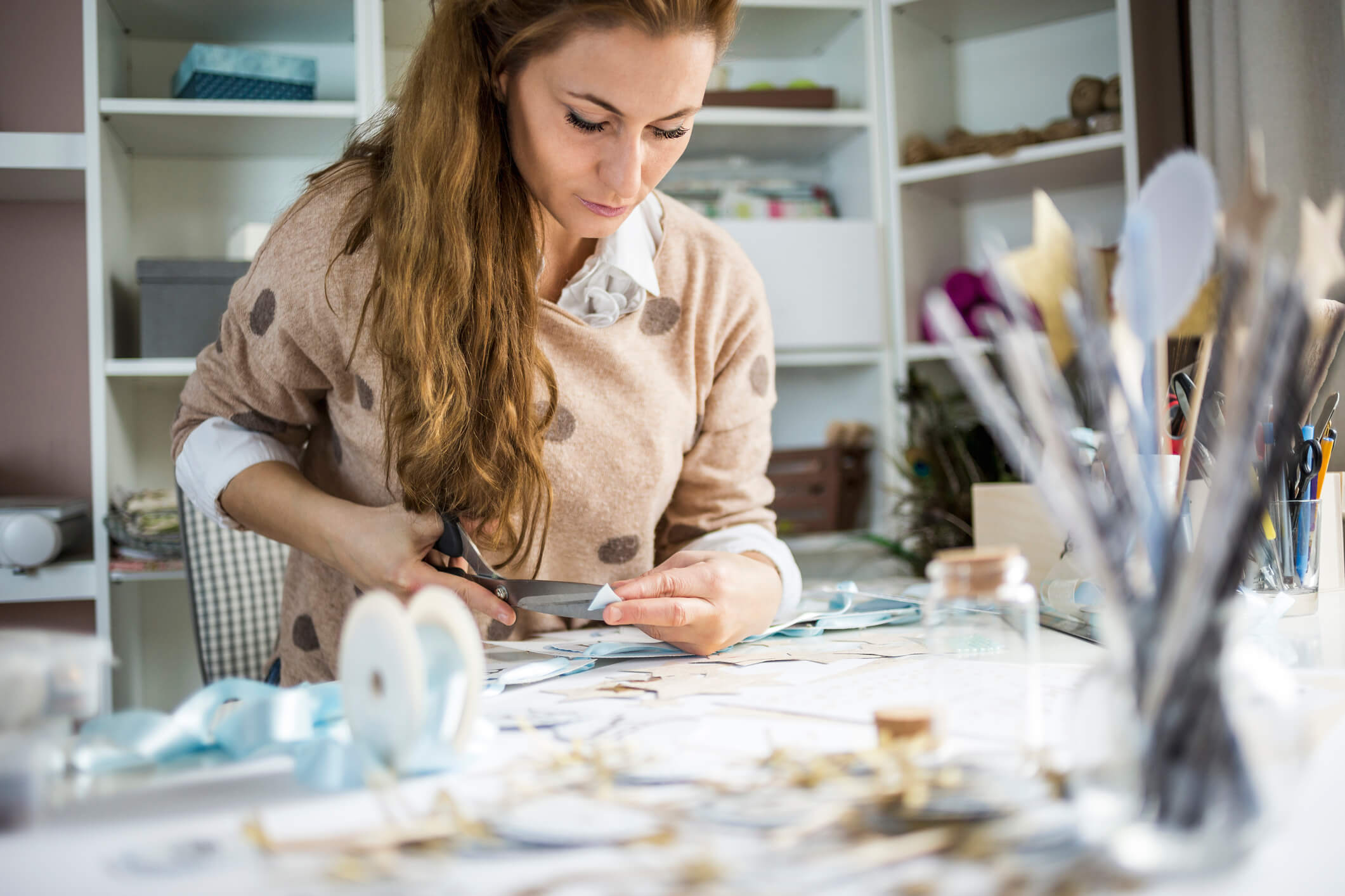 woman cutting, how to make a vision board