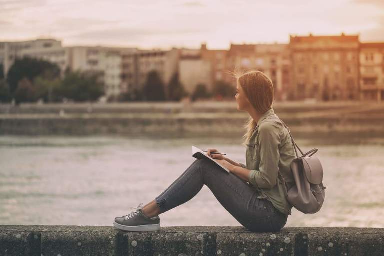 woman writing, mantras to live by