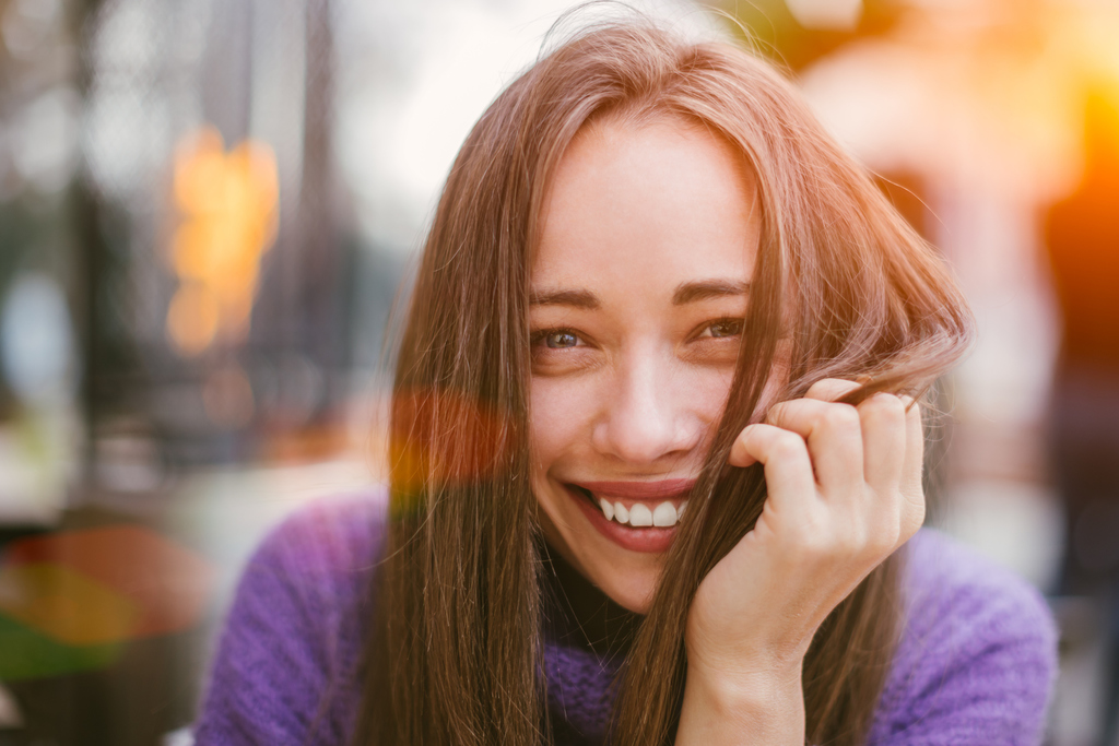 woman smiling in front of the camera compliments for women