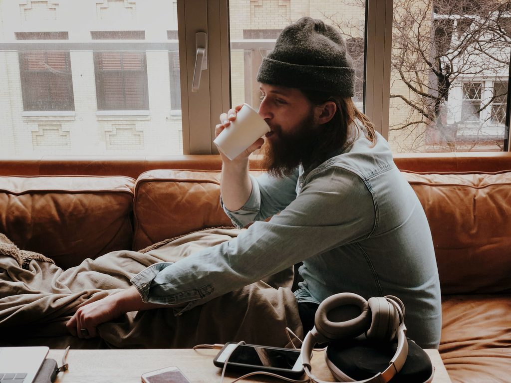 man drinking coffee in the morning morning affirmations