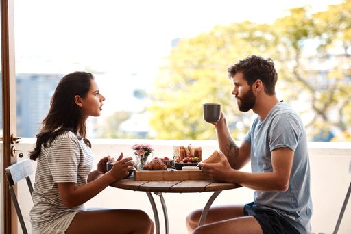 couple having a meal together how to end an emotional affair