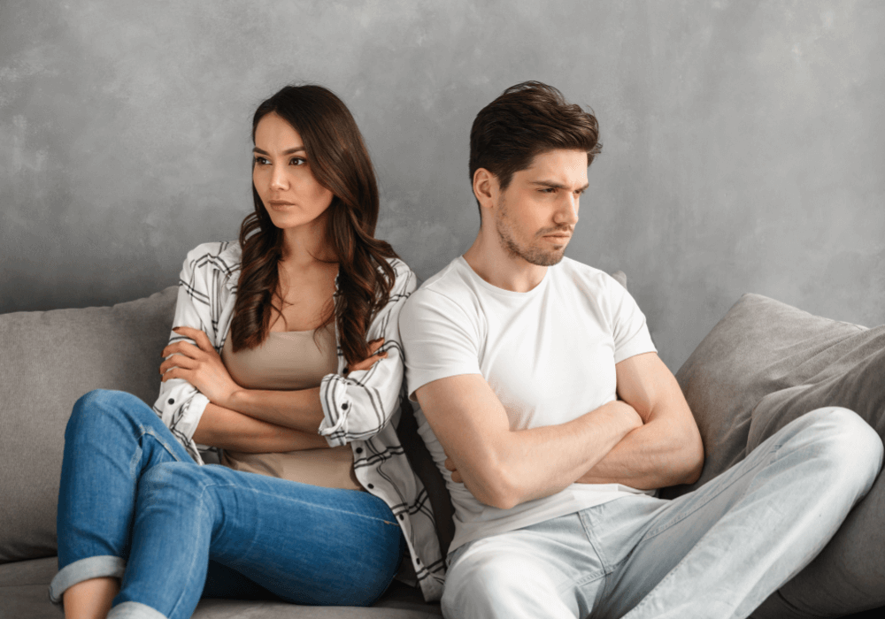 couple sitting side by side ways to deal with a disrespectful husband