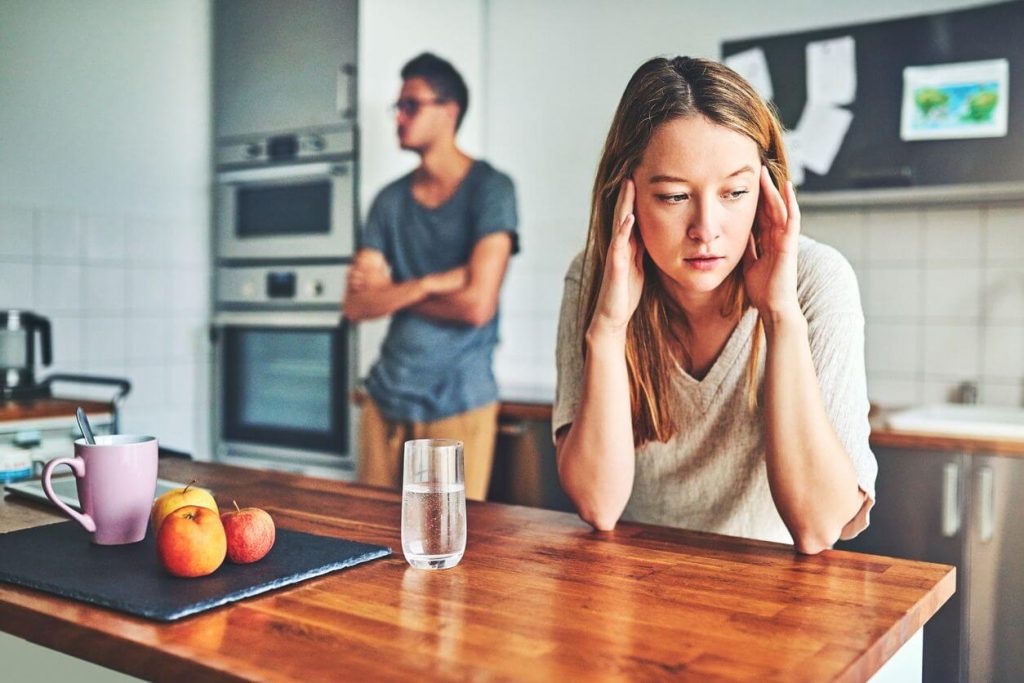 couple in kitchen stressed Signs of Controlling Men