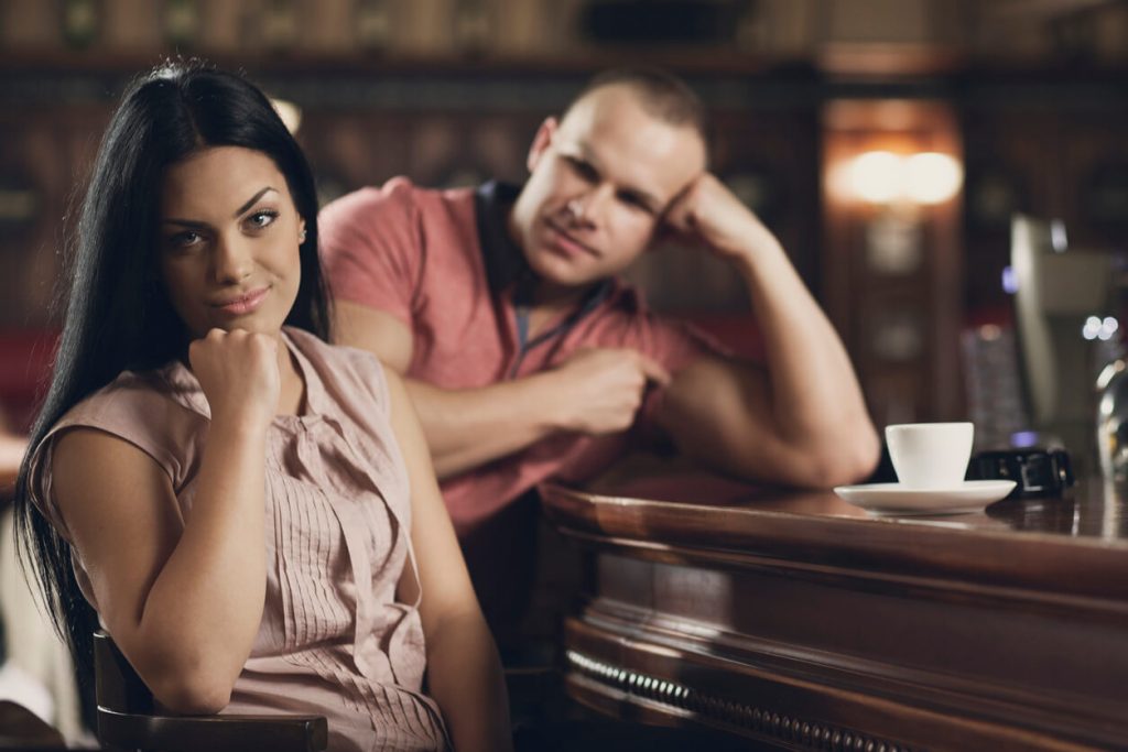 couple sitting at coffee bar turn-offs for women