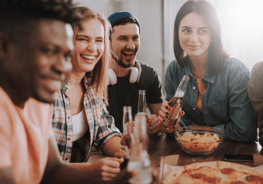 group at dinner table truth or drink questions for couples