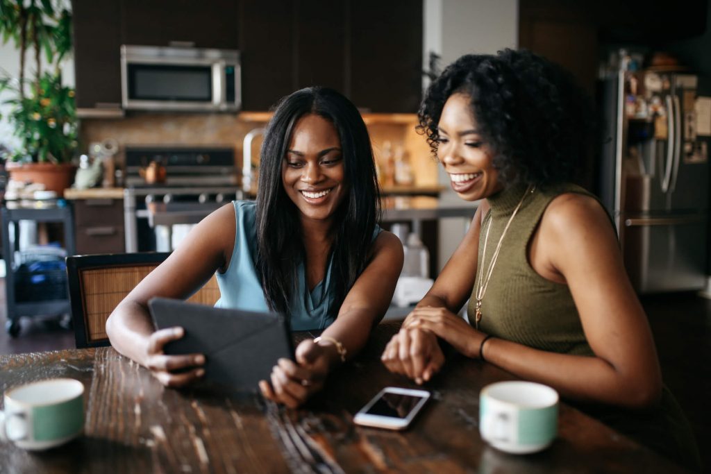 women having coffee questions to ask your sister