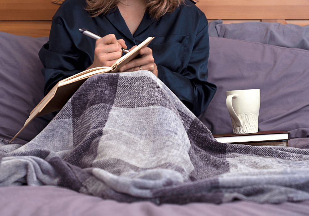 Woman Journaling in Bed,Therapeutic Journaling Prompts