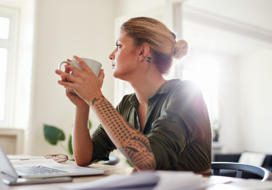 woman drinking coffee overly worried women’s intuition