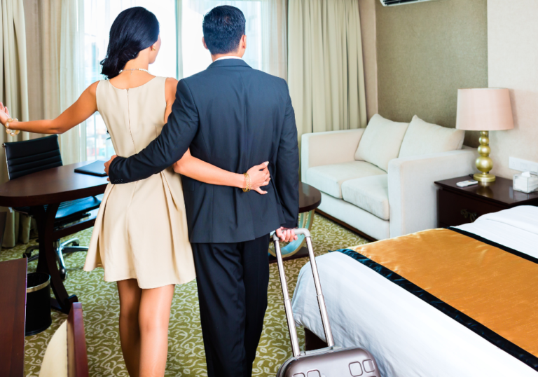 man and woman entering a hotel room characteristics of a cheating man