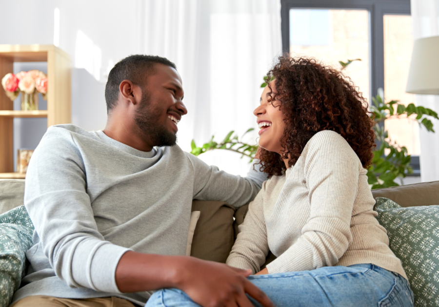 sweet couple sitting on the sofa interdependent relationship