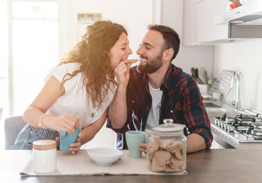 sweet couple happily sharing a snack interdependent relationship