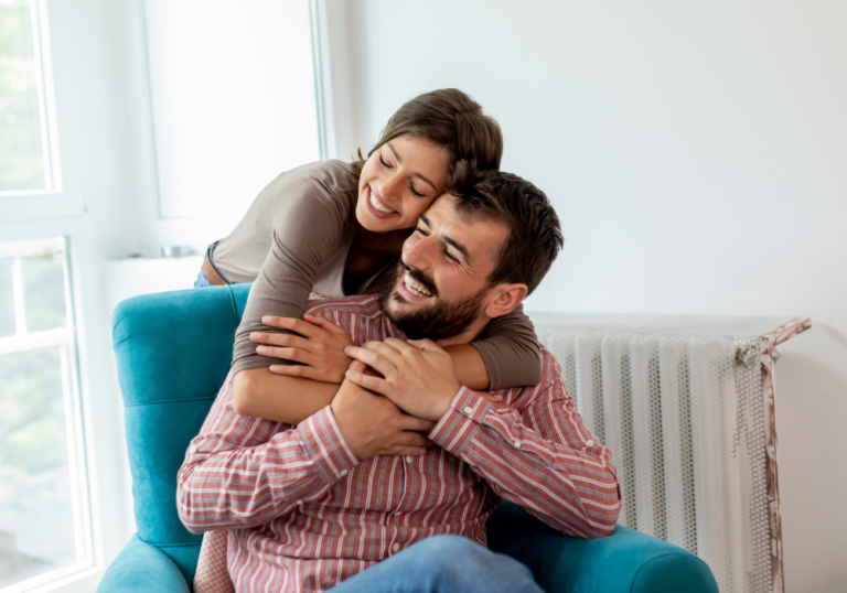 young couple sweetly hugging interdependent relationship