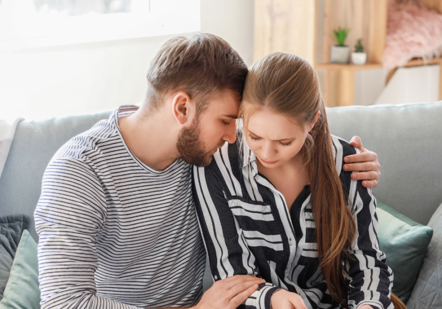 man comforting his girlfriend dating someone who was abused by a narcissist