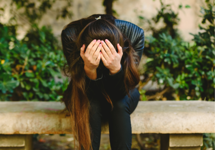 woman frustrated thinking about things how to deal with someone who plays the victim