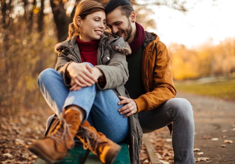 happy couple in autumn clothes how to be confident in a relationship